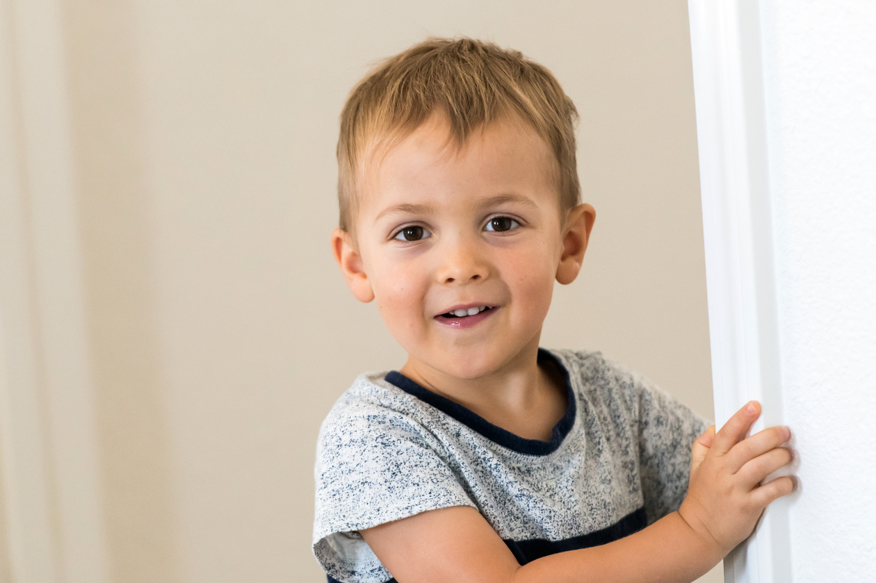 smiling toddler posing smiling